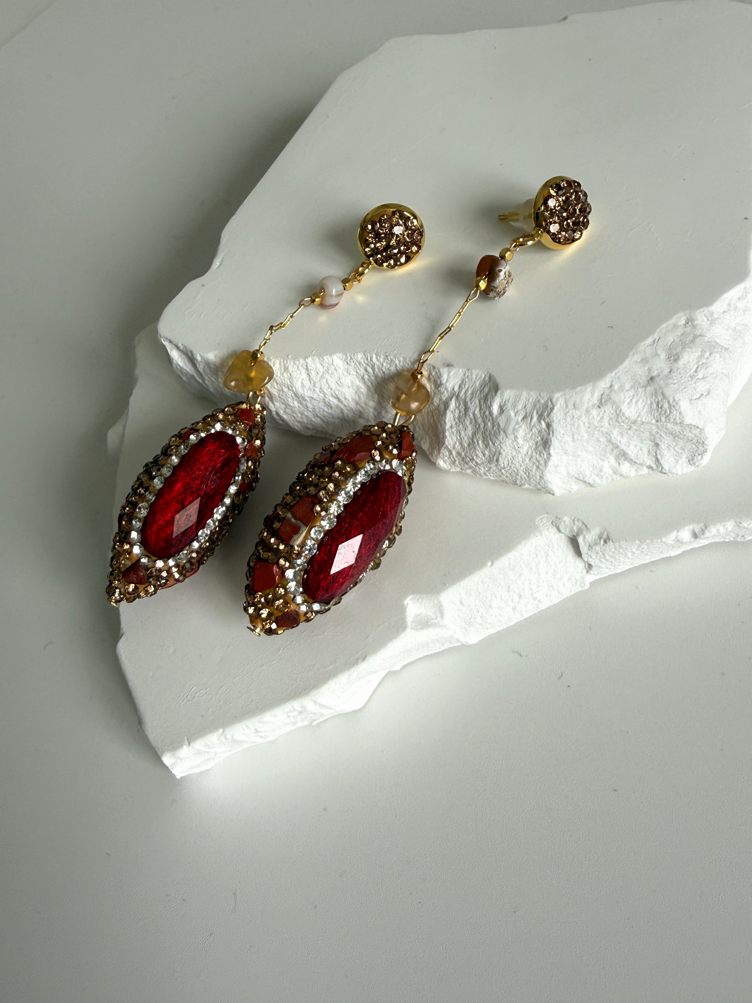 GOCCE DI PIETRE ROSSE